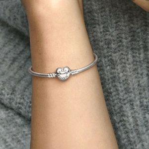 Pandora Moments silver charm bracelet with heart clasp - 20cm.